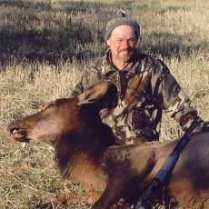 Rocky Mountain Elk Cow hunter-husband